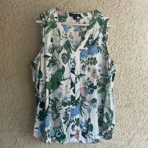 Sleeveless top to wear plain or under a jacket to dress up